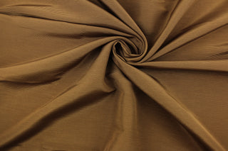  A mock linen in a beautiful solid bronze. 