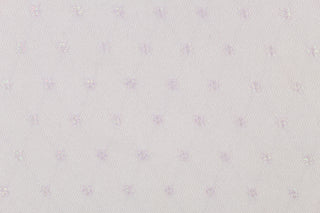 This lace features a woven floral design in a pale purple with iridescent sparkle