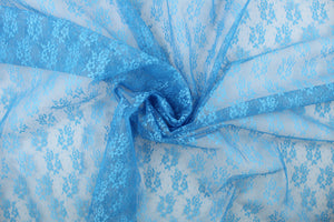  This lace features a small woven floral design in a true blue  .