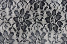 Load image into Gallery viewer, This lace features a woven floral design in gray with a white outline.
