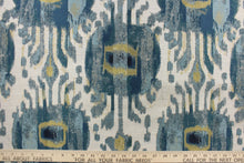 Load image into Gallery viewer, This tapestry features a unique design in blue and gold set against a slivery white . 
