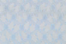 Load image into Gallery viewer, This lace features a woven floral design in a light blue .
