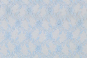This lace features a woven floral design in a light blue .