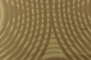 Geometric multi-layer, circular pattern in tone on tone colors in beige, khaki, brown and gold tones