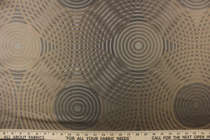 Geometric multi-layer, circular pattern in tone on tone colors in pewter, gray, black and gold tones