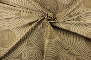 Geometric multi-layer, circular pattern in tone on tone colors in taupe, khaki, beige and gold tones