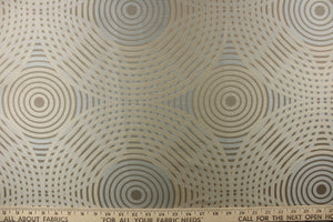 Geometric multi-layer, circular pattern in tone on tone colors in light khaki, champagne, pale blue  and light gold tones