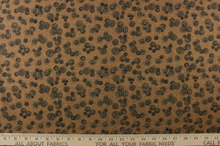  This elegant quilting print features vintage buttons in a black outline/shading in different sizes set against a tan background. 