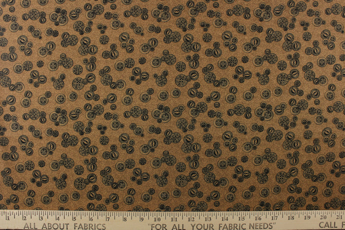  This elegant quilting print features vintage buttons in a black outline/shading in different sizes set against a tan background. 