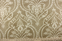 Load image into Gallery viewer,  A beautiful damask design in white on a beige or khaki color with a vintage distressed look. 
