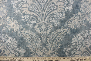 A large demask design in gray, and blue colors 