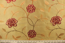 Load image into Gallery viewer,  This stunning fabric features a embroider  flower in red and orange on a gold background. 
