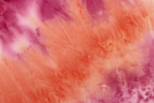 Load image into Gallery viewer,   This lycra features an 8 way stretch in a  fun tie dye design, with colors of orange, deep pink and hints of white.
