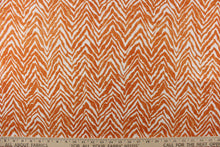 Load image into Gallery viewer, This fabric features a chevron tiger stripe in orange against a white background. 
