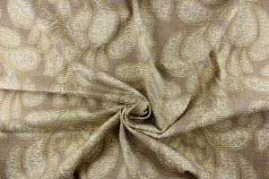  This fabric features a beautiful demask design in cream and gold against a light beige background. 