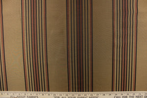 This fabric features a striped design in brown, black and gold on a bronze  background. 