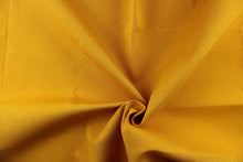 Load image into Gallery viewer, This fabric in a solid golden yellow color with red undertones is great for umbrellas, outdoor upholstery and more.
