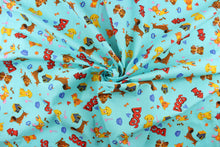 Load image into Gallery viewer, This fabric features a cute canine design with different dogs, dog toys, dog houses in pink, orange, yellow, brown, red, white and blue against a aqua blue background. 
