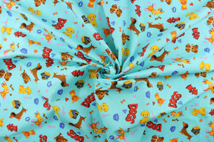 This fabric features a cute canine design with different dogs, dog toys, dog houses in pink, orange, yellow, brown, red, white and blue against a aqua blue background. 
