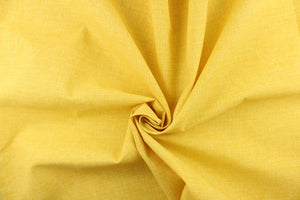 This bright yellow outdoor fabric features a slight basket weave design.