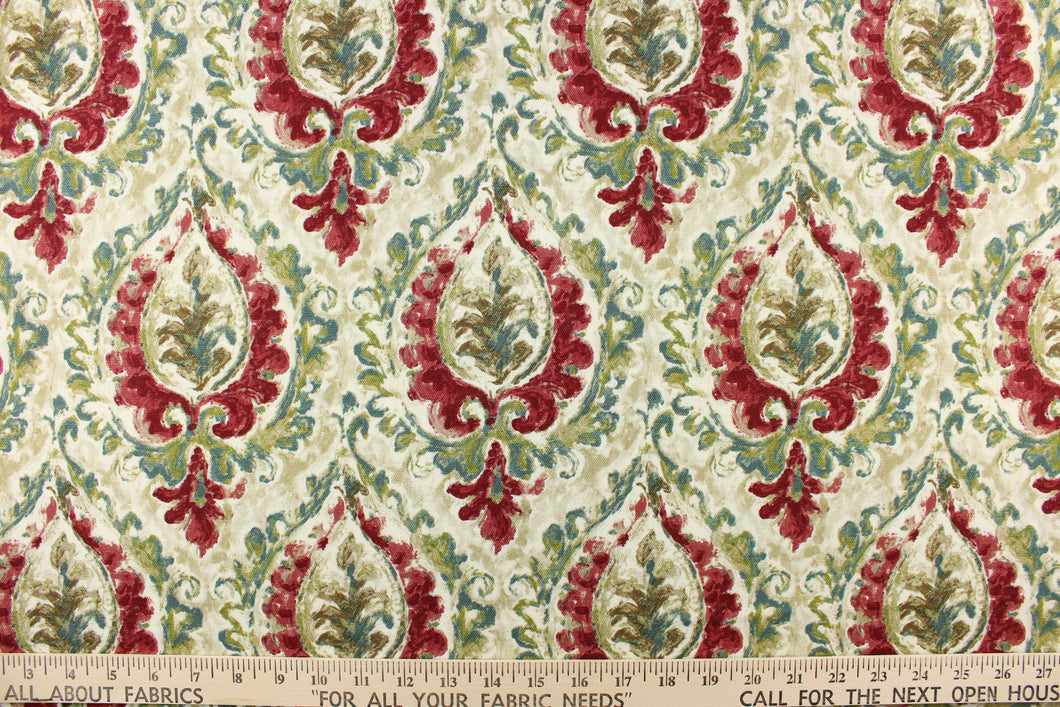 This fabric features a damask design in green, teal, cherry red, brown, beige, and cream. 