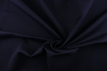 Load image into Gallery viewer, This fabric in a solid dark navy blue color is great for umbrellas, outdoor upholstery and more.
