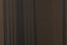 Load image into Gallery viewer,  This fabric features a striped design in black on a brown background. 
