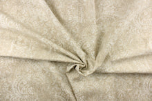 Load image into Gallery viewer,  This beautiful fabric features a demask design in a beige with hints of white. 
