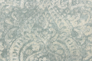 This beautiful fabric features a demask design in a blue gray with hints of white.
