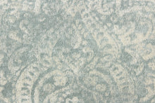 Load image into Gallery viewer, This beautiful fabric features a demask design in a blue gray with hints of white.
