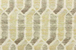  This fabric features a geometric design in brown gray tone, light green tone and white with hints of gray.