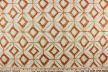 Load image into Gallery viewer, This fabric features a geometric design of diamonds in shades of orange with light khaki shading on a off white background. 
