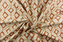 Load image into Gallery viewer, This fabric features a geometric design of diamonds in shades of orange with light khaki shading on a off white background. 
