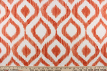 Load image into Gallery viewer, This geometric design features a diamond pattern in orange and white.
