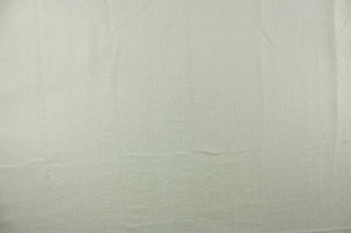 This solid linen fabric in aqua is great for multi purpose upholstery, bedding, accent pillows and drapery. 