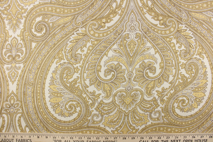  This gorgeous linen embroidered paisley print would be a great accent to any room in your home.  It can be used for multi purpose upholstery, bedding, accent pillows and drapery.   Colors included are gold, yellow and white.
