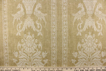 Load image into Gallery viewer, This linen/cotton blend fabric has a Damask pattern featuring stipes and a Phoenix set against a natural background.  It can be used for multi purpose upholstery, bedding, accent pillows and drapery. Colors included are off white and natural.
