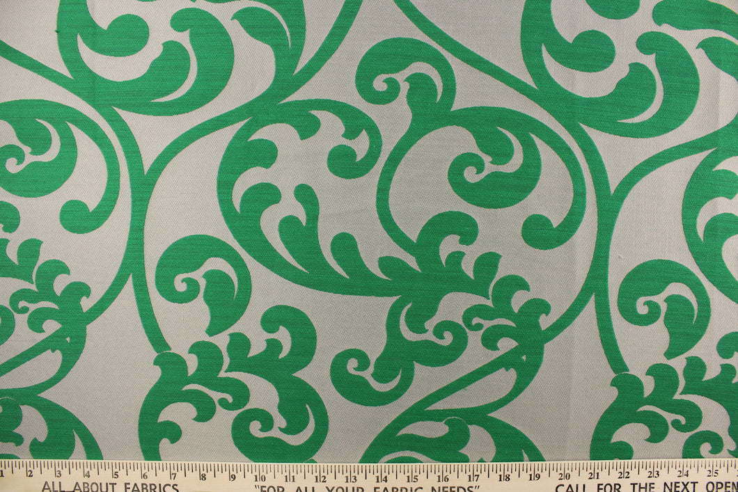  This beautiful tapestry fabric features a scroll design on a solid background.  It can be used for bedding, drapery and accent pillows.  It would be a great accent in any room in your home.  Colors included are green and gray.
