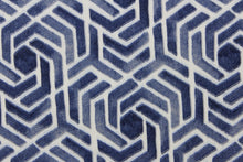 Load image into Gallery viewer, This outdoor print features a geometric design in navy blue and white.
