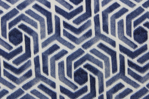 This outdoor print features a geometric design in navy blue and white.