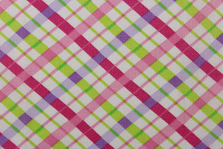 This quilting print features a diagonal plaid design in purple, pink, lime green, and a hot pink against a white background.