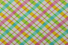 Load image into Gallery viewer,  This quilting print features a diagonal plaid design in yellow, pink, green, and a pale teal blue against a white background.
