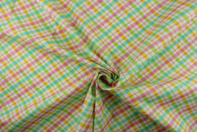 Load image into Gallery viewer,  This quilting print features a diagonal plaid design in yellow, pink, green, and a pale teal blue against a white background.
