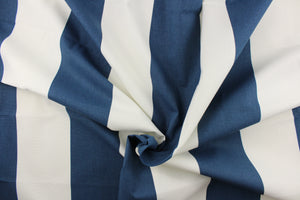 This fabric features a wide striped design in dark blue and white.