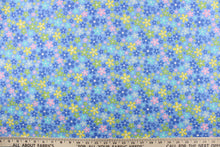 Load image into Gallery viewer, This cute cotton fabric features a floral design in varying shades of blue, with yellow, pink, green, and white against a blue background, 
