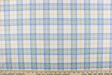 Load image into Gallery viewer,  This quilting print features a plaid design in blue, white, green, and a orangey yellow.
