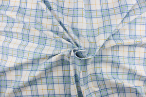  This quilting print features a plaid design in blue, white, green, and a orangey yellow.