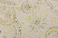Load image into Gallery viewer, This fabric features a paisley vine design in a pale lime green and gray on a natural background. 
