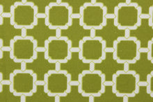 Load image into Gallery viewer, This outdoor fabric features a geometric design in white against a pear green background.
