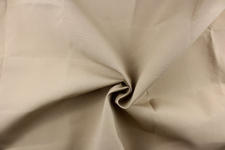 This fabric in a solid khaki color is great for umbrellas, outdoor upholstery and more. 